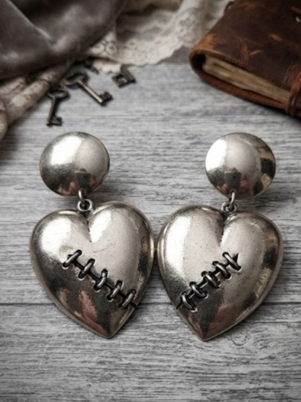 Edgy Statement Silver Broken Heart Stitched Drop Earrings